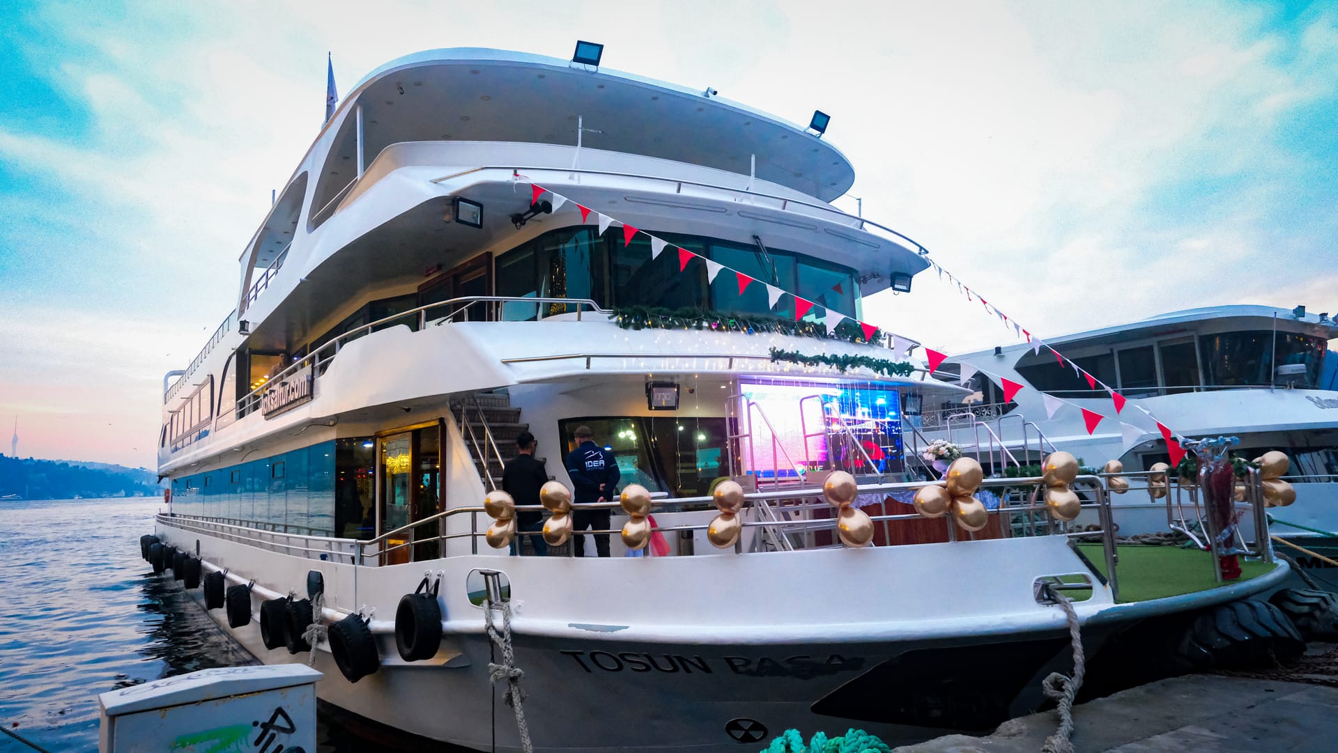 Bosphorus dinner cruise boat docked at the pier in Istanbul