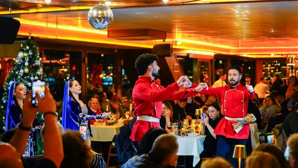 Traditional dance performance in costume during the onboard show