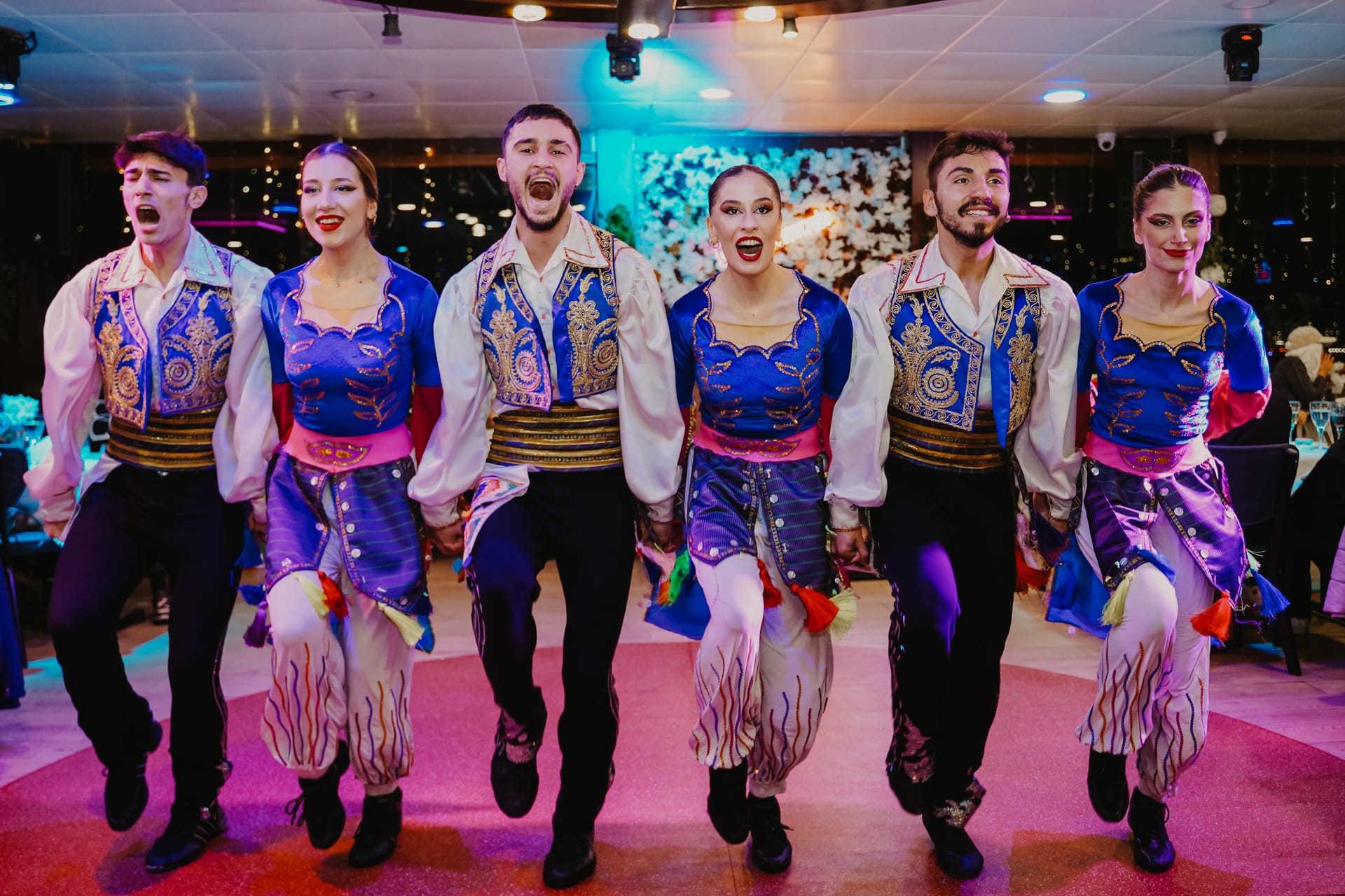 Turkish folk dancers performing in traditional costume on the cruise